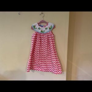 ANAVINI hand smocked children’s dress.